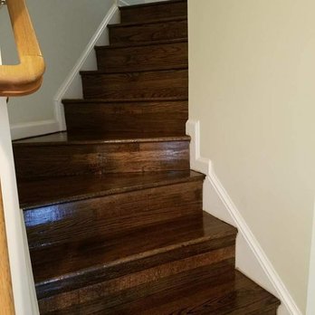 AG Construction - poly-satin finish still wet on dark floors.  The floors actually dried much darker than this which we wanted. - Flooring Near Me