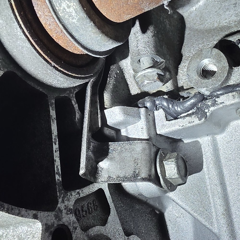 Midas - Silicone leaking out of the side of the oil pan. - Auto Repair Near Me - Kokomo, Indiana Midas - Silicone leaking out of the side of the oil pan. - Auto Repair Near Me - Kokomo, Indiana