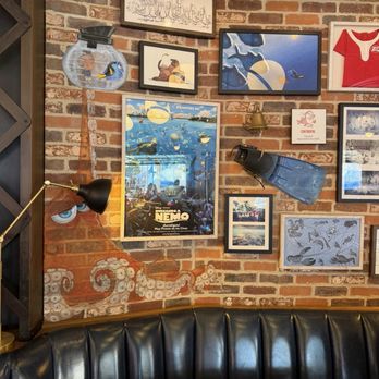 Lamplight Lounge - Inside wall art - New American Near Me - Anaheim, California
