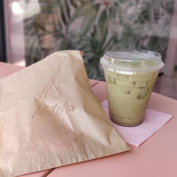 Holy Matcha - Iced horchata matcha latte and a pink donut - Tea Rooms Near Me - San Diego, California Holy Matcha - Iced horchata matcha latte and a pink donut - Tea Rooms Near Me - San Diego, California
