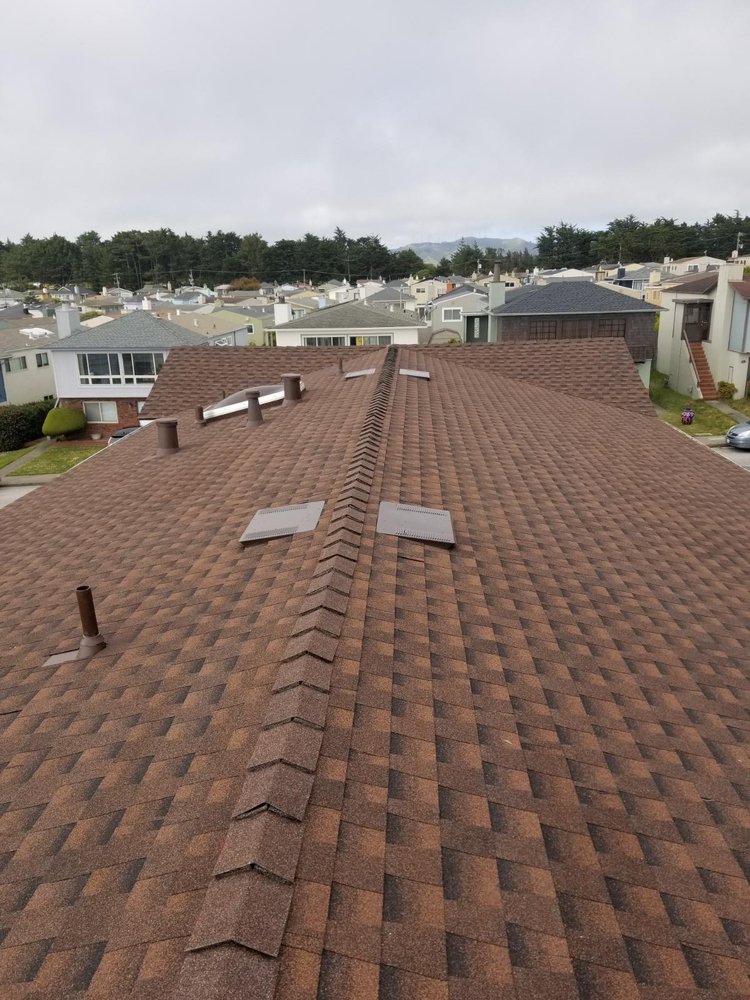 Slide of Caruzo's Roofing Contractors