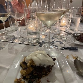 Muse Cafe - a plate of dessert and wine glasses - Coffee & Tea Near Me - Cincinnati, Ohio