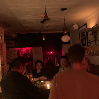 Bar Illegal - a group of people sitting at a bar - Bars Near Me - New York, New York Bar Illegal - a group of people sitting at a bar - Bars Near Me - New York, New York
