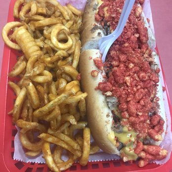Lefty's Cheesesteaks - South Paw topped with Cheetos and cheese sauce - Sandwiches Near Me - Livonia, Michigan