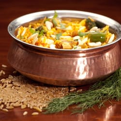 India Restaurant - One of our wonderfully fragrant biryanis. Basmati rice slow cooked together with meats or vegetables of your choice.