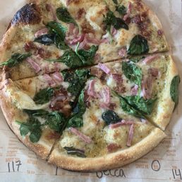 Personal hame and spinach pizza Personal hame and spinach pizza