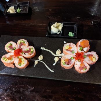 Raiz Kitchen Sushi Bar - Pink Flower: Tuna, Salmon, Asparagus, Avocado wrapped in soybean sheet, topped with tobiko and honey miso - Sushi Bars Near Me - Chicago, Illinois Raiz Kitchen Sushi Bar - Pink Flower: Tuna, Salmon, Asparagus, Avocado wrapped in soybean sheet, topped with tobiko and honey miso - Sushi Bars Near Me - Chicago, Illinois