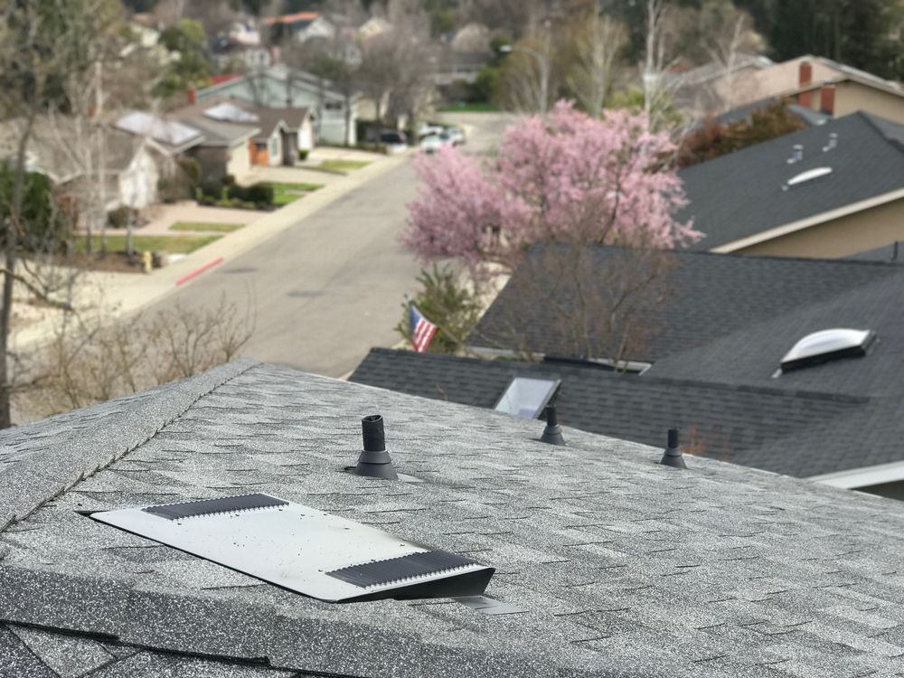 Slide of Maciel Roofing Construction