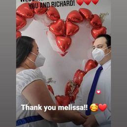 They had a backdrop of balloons They had a backdrop of balloons