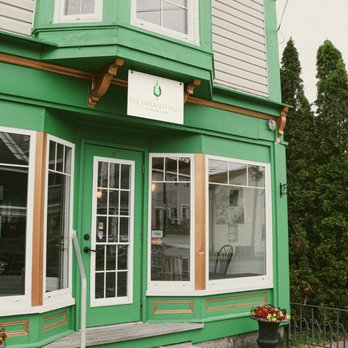 The Emerald Light - the front of a green building - Acai Bowls Near Me - Shelburne, Nova Scotia