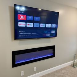 Smart Home Services - 65" TV WIRELESS INSTALLATION AND LED RECESSED FIREPLACE.