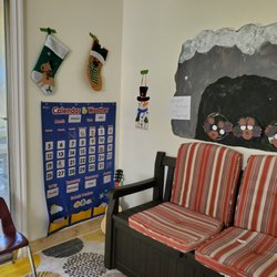 Room to Bloom Preschool & Child Care - Cozy spot for calendar and circle time activities