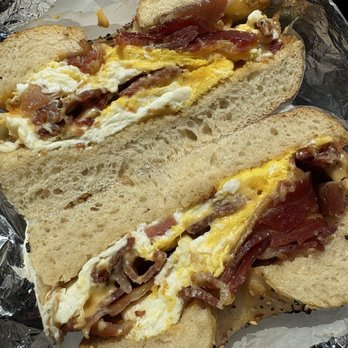 Curley's Bagels - Delicious Bacon, Egg & Cheese on a sourdough Everything Bagel. - Bagels Near Me - Sunnyside, New York Curley's Bagels - Delicious Bacon, Egg & Cheese on a sourdough Everything Bagel. - Bagels Near Me - Sunnyside, New York