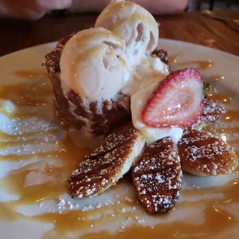 Osteria Cicchetti - White chocolate croissant bread pudding w/ cinnamon gelato and carmalized bananas - Italian Near Me - Wilmington, North Carolina Osteria Cicchetti - White chocolate croissant bread pudding w/ cinnamon gelato and carmalized bananas - Italian Near Me - Wilmington, North Carolina