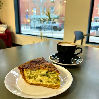 Red House Sweets - Broccoli Cheddar quiche, with an oat milk maple cappuccino from Catalyst Coffee - Bakeries Near Me - Saint Albans City, Vermont Red House Sweets - Broccoli Cheddar quiche, with an oat milk maple cappuccino from Catalyst Coffee - Bakeries Near Me - Saint Albans City, Vermont