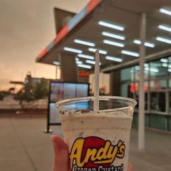 Andy's Frozen Custard - a hand holding a cup of ice cream - Ice Cream & Frozen Yogurt Near Me - Fort Worth, Texas