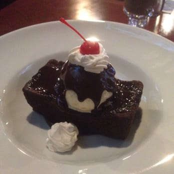 Avenue American Bistro - Homemade chocolate brownie with vanilla ice cream - Sports Bars Near Me - Wayne, Michigan Avenue American Bistro - Homemade chocolate brownie with vanilla ice cream - Sports Bars Near Me - Wayne, Michigan