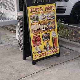 a sign for tacos el torito a sign for tacos el torito