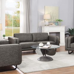 Furniture World - Delray Beach - Living room set with famous propeller coffee table