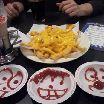 Johnny Rockets - Our fries and ketchup faces - Burgers Near Me - Syracuse, New York Johnny Rockets - Our fries and ketchup faces - Burgers Near Me - Syracuse, New York