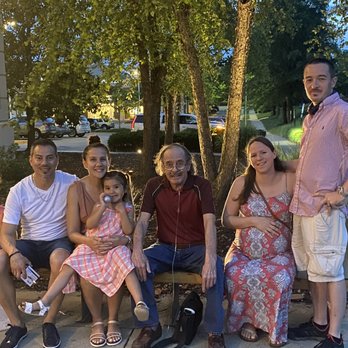 Not Your Average Joe's - Reston - Outside area with some happy customers. - New American Near Me - Reston, Virginia Not Your Average Joe's - Reston - Outside area with some happy customers. - New American Near Me - Reston, Virginia