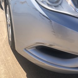 Sam's Auto Wash Express of Stillwater - Front bumper damage