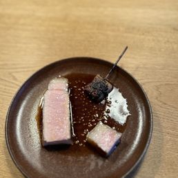 pork loin, rib cap, jowls with pork bone and mustard seed sauce