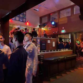 Lookout - a group of people at a bar - Gay Bars Near Me - San Francisco, California Lookout - a group of people at a bar - Gay Bars Near Me - San Francisco, California