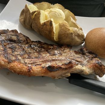 Robert's By The River - Pork steak and baked potato! - Desserts Near Me - Evansville, Indiana Robert's By The River - Pork steak and baked potato! - Desserts Near Me - Evansville, Indiana