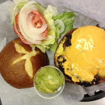 Smilin Goat - Jalapeño Burger with wholly guacamole on pretzel bun! - Sports Bars Near Me - Lyons, Illinois