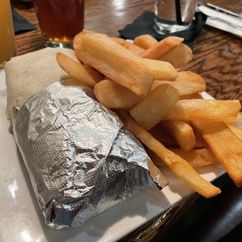 Grog Restaurant - Incredibly delicious fish burrito the weight of a baby with a massively generous side of awesome steak cut fries. - American Near Me - Newburyport, Massachusetts