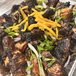 Smothered Smoke Chicken glaze with Hickory Jerk sauce
