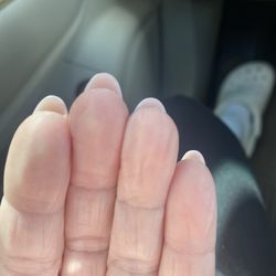 Sparkle Nails Salon - Nail lengths are all different