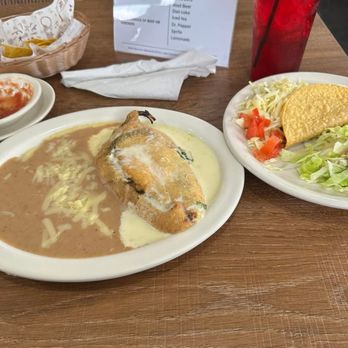 El Rey Mexican & Bar - Chile Relleno with refried beans and freshly made flavorful taco with guacamole.  9.99 includes drink. - Tacos Near Me - Lake Charles, Louisiana