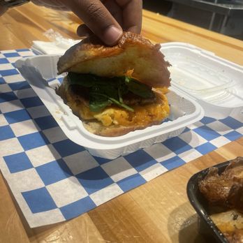 Sunny Side Cafe - Salmon sausage egg, cheese and spinach on brioche - Breakfast & Brunch Near Me - Baltimore, Maryland Sunny Side Cafe - Salmon sausage egg, cheese and spinach on brioche - Breakfast & Brunch Near Me - Baltimore, Maryland