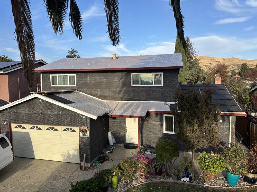 Slide of Umbrella Plastering & Roofing