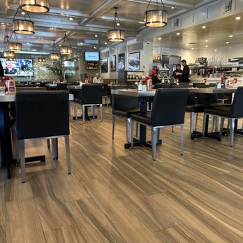 Lovi's Delicatessen - Main dining area with private room in the back. - Delis Near Me - Calabasas, California Lovi's Delicatessen - Main dining area with private room in the back. - Delis Near Me - Calabasas, California