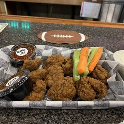 Pudgy's Sport Pub - 10pc dry wings w/two sauces! FYI mama joy sauce is kinda spicy (like a sweet chili)