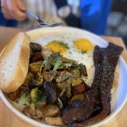 Sweet Maple - Two eggs, sunny side up, Millionaire's bacon - the potatoes are legendary