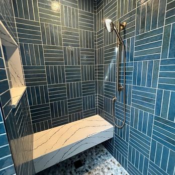 Nik Construction & Remodeling - Shower with floating bench and soap niche - General Contractors Near Me