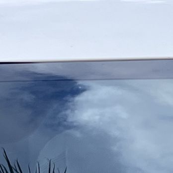 Safelite AutoGlass - left side shows nice black seal btwn the windshield & white frame of  car & middle to right shows the black seal is tucked in. - Auto Glass Services Near Me - Escondido, California