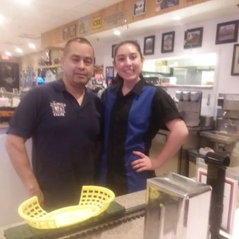 2Toots Train Whistle Grill - Juan on the left, and Katia on the right.  Great food,  fun and service. - Diners Near Me - Bartlett, Illinois