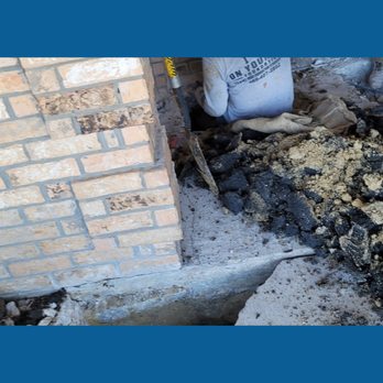On Your Side Foundation Repair - a pile of rubble next to a brick wall - Masonry/Concrete Near Me - Dallas, Texas On Your Side Foundation Repair - a pile of rubble next to a brick wall - Masonry/Concrete Near Me - Dallas, Texas