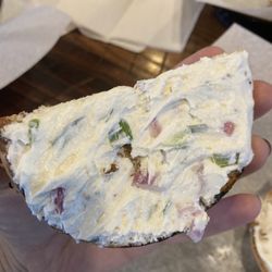 New York Bagel Cafe - 1/4 of a Garlic bagel w onion and chive cream cheese