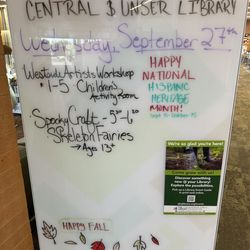 Central and Unser Library - Welcome sign.