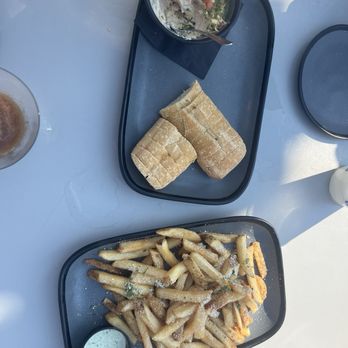 Saltwater 75 - Truffle fries and roasted tomato, feta, pesto dip - Seafood Near Me - Ocean City, Maryland