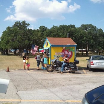 Crone's Cones - a man on a motorcycle in a parking lot - Shaved Ice Near Me - Mansfield, Texas Crone's Cones - a man on a motorcycle in a parking lot - Shaved Ice Near Me - Mansfield, Texas