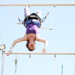 Fly Boise - Aerial silks involves long silk fabric upon which artists climb, spin, wrap and dance.
