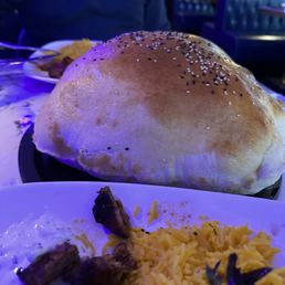 Lavash Baloon Bread. We didn't order until we saw it served to a neighboring table. So glad we did! Fresh, fun, and steamy!