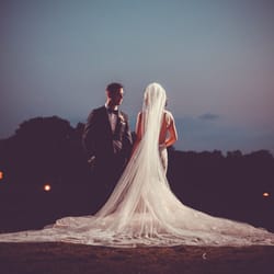 Custom cathedral veil with hand-cut French lace applique by Boutique de Voile from Bridal Reflections. Photo Cred: Lighthouse Photograghy